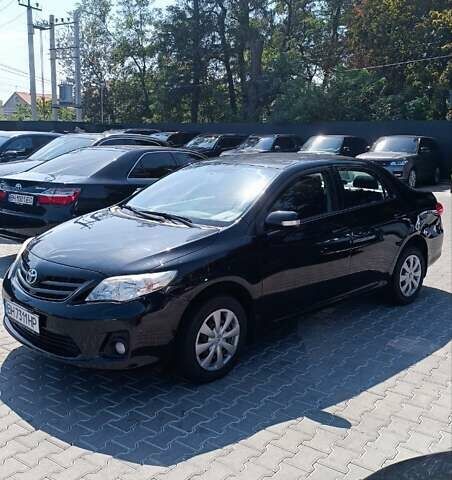 Черный Тойота Королла, объемом двигателя 1.33 л и пробегом 72 тыс. км за 8700 $, фото 14 на Automoto.ua