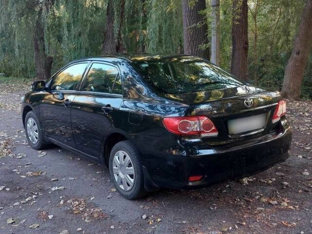 Черный Тойота Королла, объемом двигателя 1.3 л и пробегом 115 тыс. км за 5499 $, фото 5 на Automoto.ua