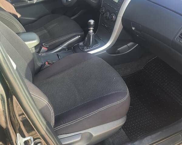 Черный Тойота Королла, объемом двигателя 1.33 л и пробегом 176 тыс. км за 8500 $, фото 19 на Automoto.ua