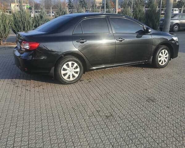 Черный Тойота Королла, объемом двигателя 1.33 л и пробегом 176 тыс. км за 8500 $, фото 22 на Automoto.ua