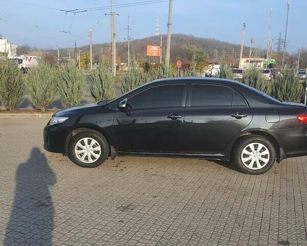 Черный Тойота Королла, объемом двигателя 1.33 л и пробегом 176 тыс. км за 8500 $, фото 33 на Automoto.ua