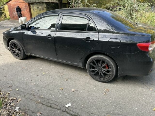 Черный Тойота Королла, объемом двигателя 1.3 л и пробегом 228 тыс. км за 7200 $, фото 1 на Automoto.ua