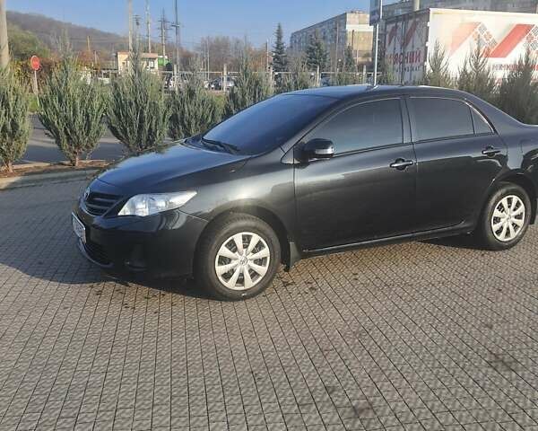 Черный Тойота Королла, объемом двигателя 1.33 л и пробегом 176 тыс. км за 8500 $, фото 32 на Automoto.ua