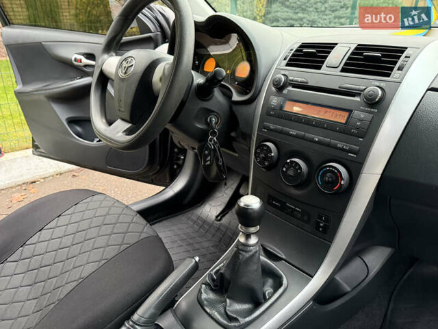 Черный Тойота Королла, объемом двигателя 1.4 л и пробегом 235 тыс. км за 7350 $, фото 24 на Automoto.ua