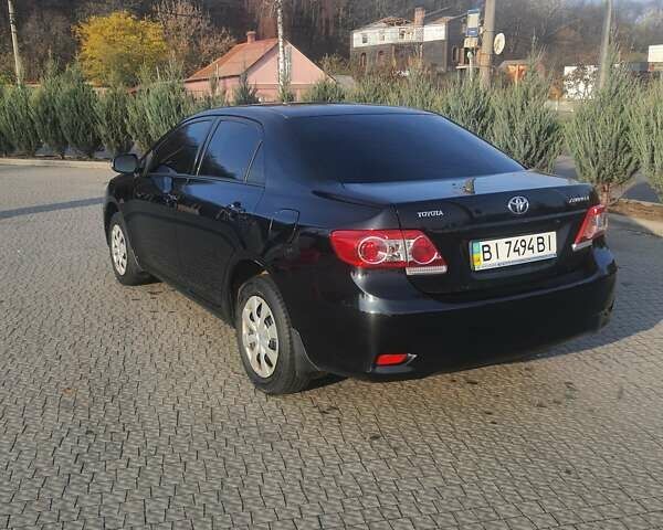 Черный Тойота Королла, объемом двигателя 1.33 л и пробегом 176 тыс. км за 8500 $, фото 27 на Automoto.ua