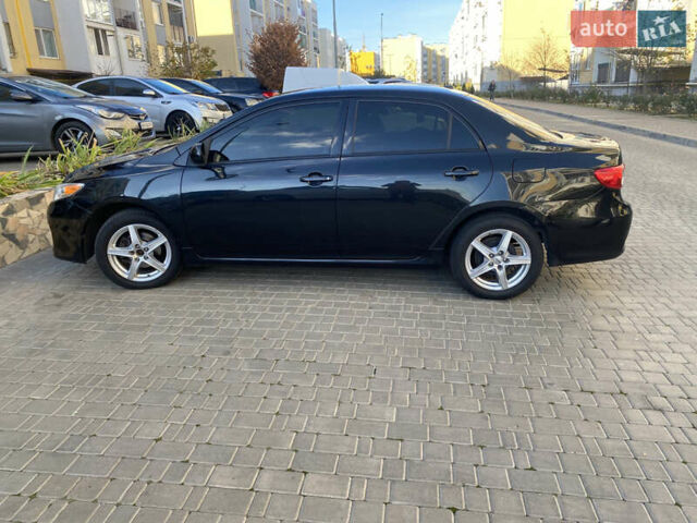 Черный Тойота Королла, объемом двигателя 1.8 л и пробегом 299 тыс. км за 10500 $, фото 4 на Automoto.ua