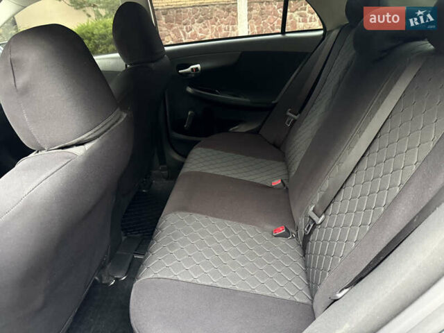 Черный Тойота Королла, объемом двигателя 1.4 л и пробегом 235 тыс. км за 7350 $, фото 20 на Automoto.ua