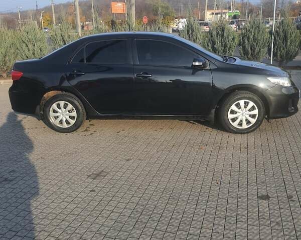 Черный Тойота Королла, объемом двигателя 1.33 л и пробегом 176 тыс. км за 8500 $, фото 23 на Automoto.ua