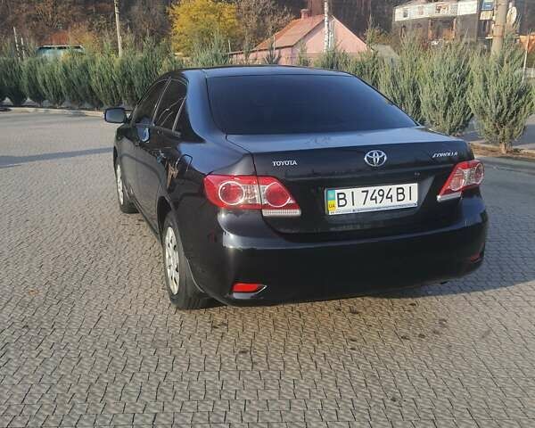 Черный Тойота Королла, объемом двигателя 1.33 л и пробегом 176 тыс. км за 8500 $, фото 26 на Automoto.ua