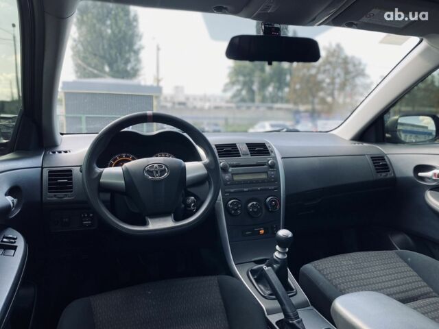 Черный Тойота Королла, объемом двигателя 1.3 л и пробегом 43 тыс. км за 10900 $, фото 15 на Automoto.ua