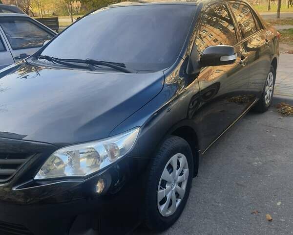 Черный Тойота Королла, объемом двигателя 1.33 л и пробегом 176 тыс. км за 8500 $, фото 4 на Automoto.ua