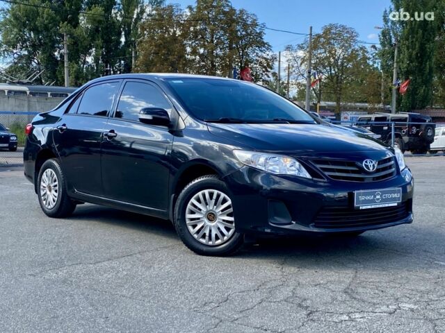 Черный Тойота Королла, объемом двигателя 1.3 л и пробегом 43 тыс. км за 10900 $, фото 2 на Automoto.ua