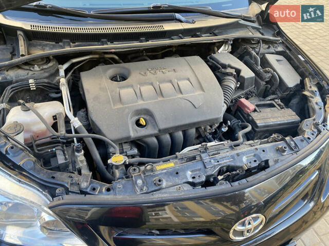 Черный Тойота Королла, объемом двигателя 1.8 л и пробегом 299 тыс. км за 10500 $, фото 1 на Automoto.ua