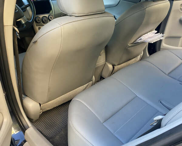 Черный Тойота Королла, объемом двигателя 1.8 л и пробегом 299 тыс. км за 10500 $, фото 5 на Automoto.ua