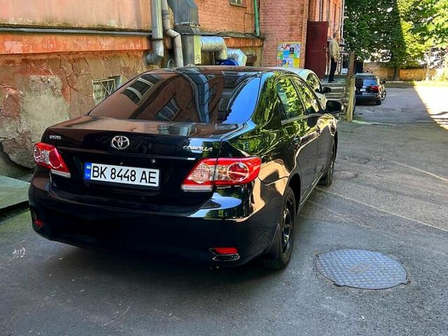 Черный Тойота Королла, объемом двигателя 1.3 л и пробегом 230 тыс. км за 6900 $, фото 1 на Automoto.ua