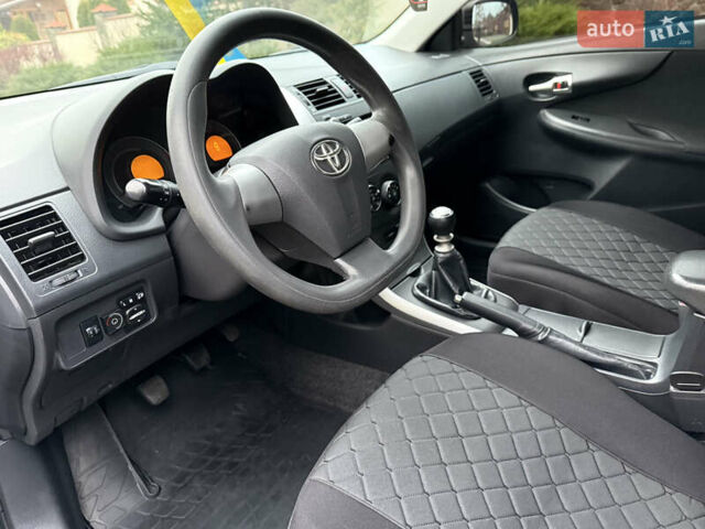 Черный Тойота Королла, объемом двигателя 1.4 л и пробегом 235 тыс. км за 7350 $, фото 13 на Automoto.ua
