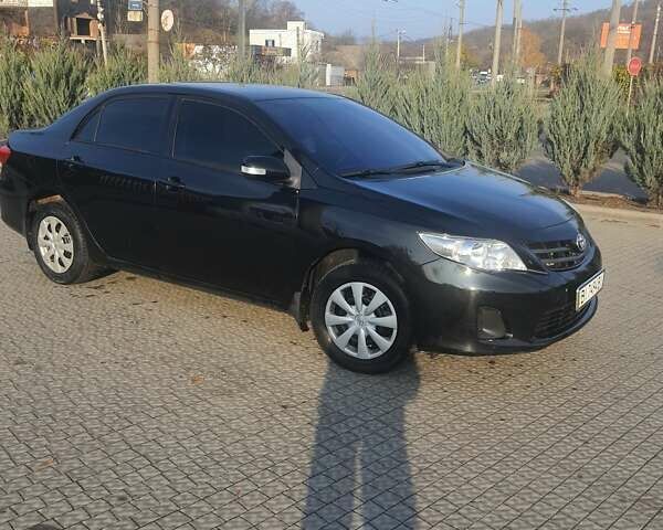 Черный Тойота Королла, объемом двигателя 1.33 л и пробегом 176 тыс. км за 8500 $, фото 24 на Automoto.ua