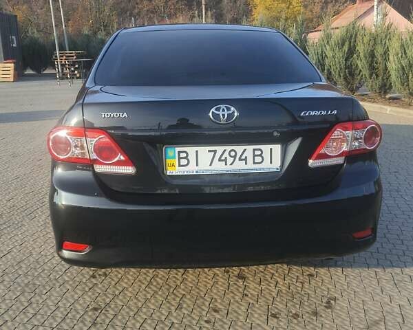 Черный Тойота Королла, объемом двигателя 1.33 л и пробегом 176 тыс. км за 8500 $, фото 25 на Automoto.ua