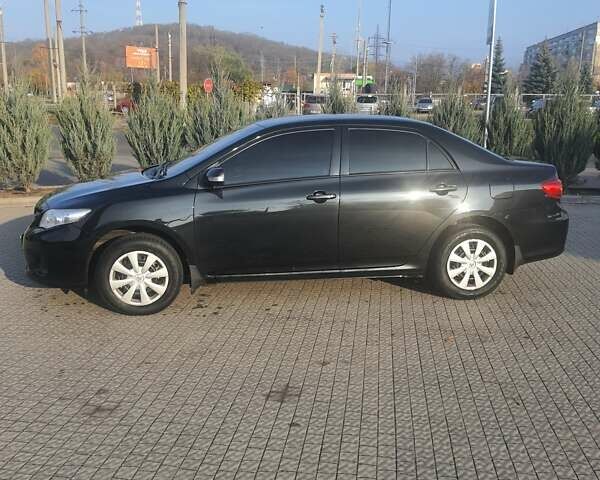 Черный Тойота Королла, объемом двигателя 1.33 л и пробегом 176 тыс. км за 8500 $, фото 34 на Automoto.ua