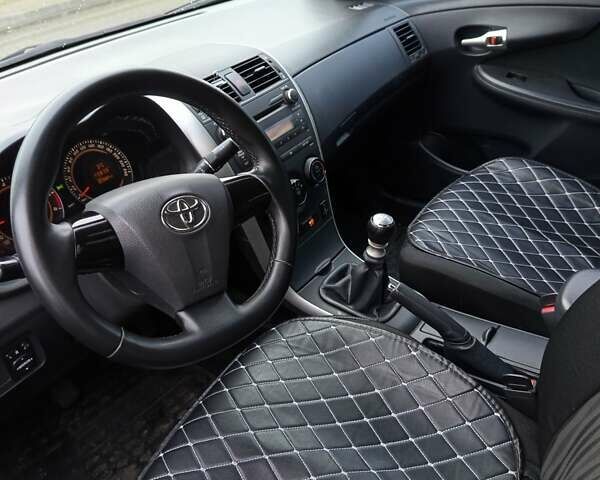 Черный Тойота Королла, объемом двигателя 1.3 л и пробегом 224 тыс. км за 6200 $, фото 9 на Automoto.ua