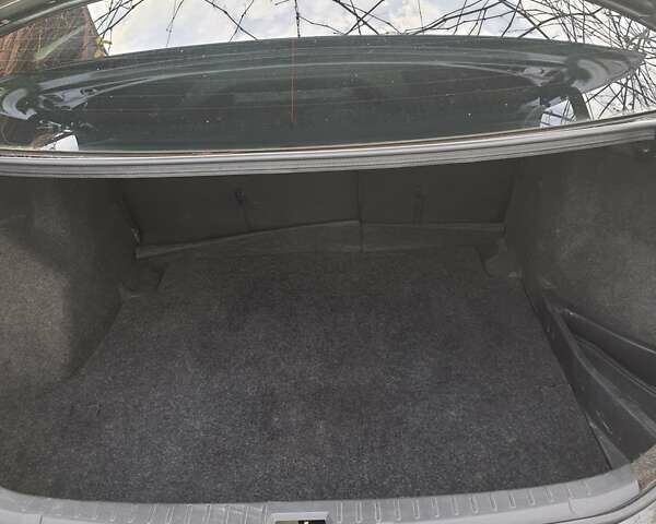 Черный Тойота Королла, объемом двигателя 1.33 л и пробегом 176 тыс. км за 8500 $, фото 2 на Automoto.ua