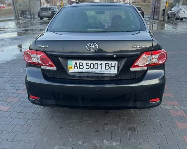 Черный Тойота Королла, объемом двигателя 1.3 л и пробегом 290 тыс. км за 7300 $, фото 1 на Automoto.ua