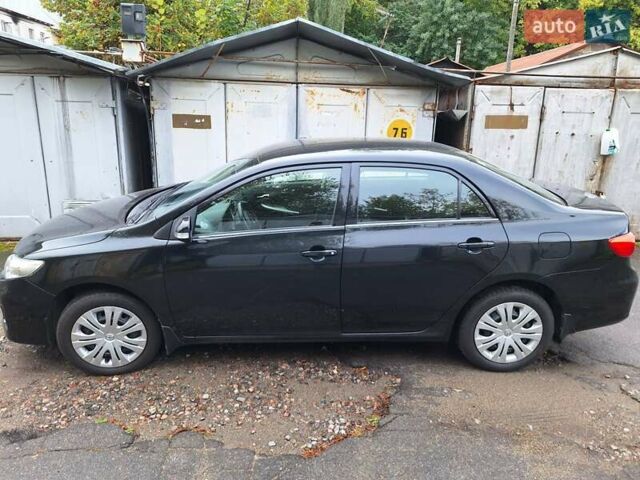 Черный Тойота Королла, объемом двигателя 1.6 л и пробегом 111 тыс. км за 8000 $, фото 1 на Automoto.ua