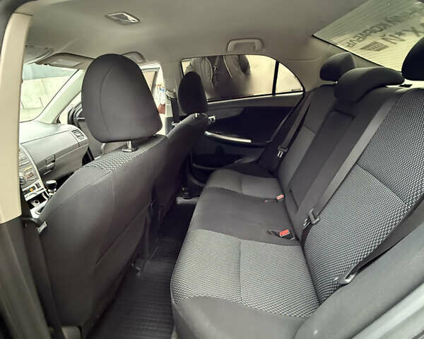 Черный Тойота Королла, объемом двигателя 1.6 л и пробегом 245 тыс. км за 8200 $, фото 12 на Automoto.ua