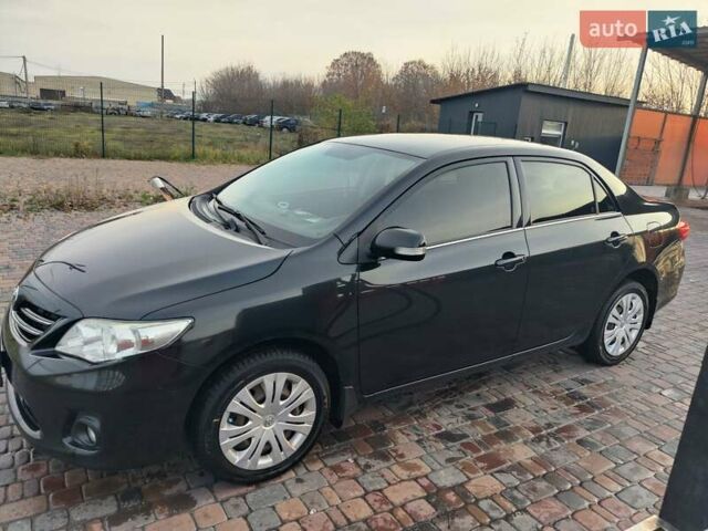 Черный Тойота Королла, объемом двигателя 1.6 л и пробегом 244 тыс. км за 8400 $, фото 1 на Automoto.ua