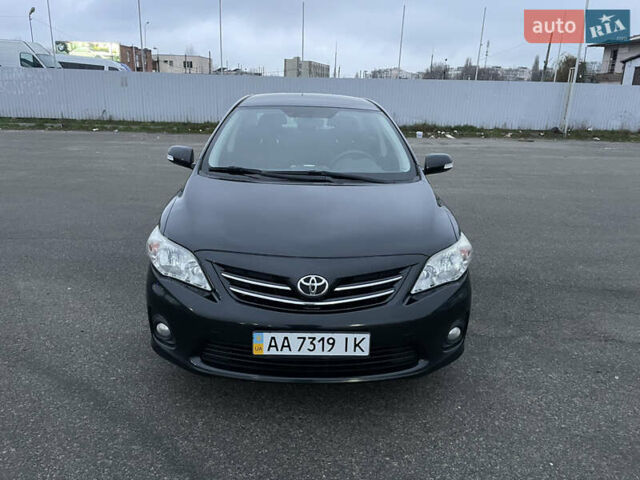 Черный Тойота Королла, объемом двигателя 1.6 л и пробегом 186 тыс. км за 10200 $, фото 1 на Automoto.ua