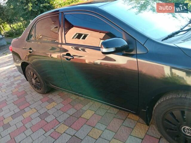 Черный Тойота Королла, объемом двигателя 1.33 л и пробегом 210 тыс. км за 6300 $, фото 8 на Automoto.ua