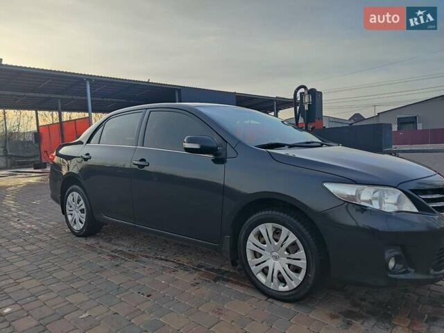 Черный Тойота Королла, объемом двигателя 1.6 л и пробегом 244 тыс. км за 8400 $, фото 5 на Automoto.ua