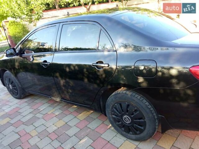Черный Тойота Королла, объемом двигателя 1.33 л и пробегом 210 тыс. км за 6300 $, фото 7 на Automoto.ua