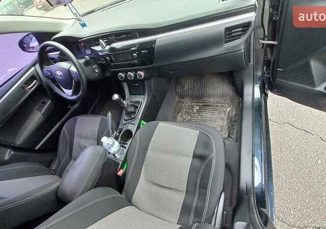 Черный Тойота Королла, объемом двигателя 1.33 л и пробегом 201 тыс. км за 8700 $, фото 1 на Automoto.ua