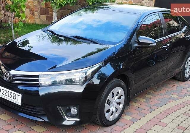 Чорний Тойота Королла, об'ємом двигуна 1.6 л та пробігом 148 тис. км за 12400 $, фото 4 на Automoto.ua