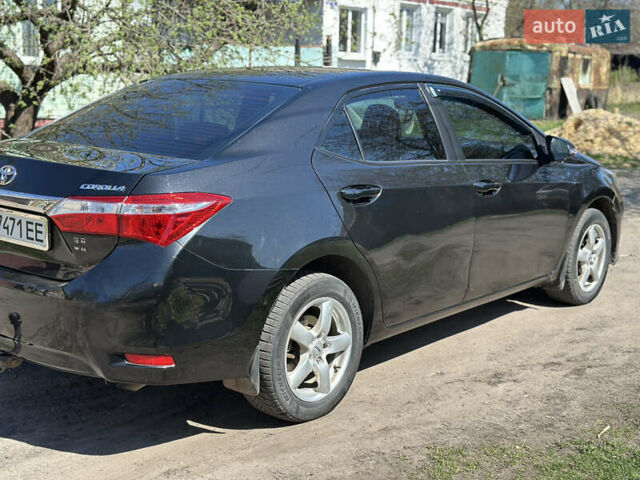 Чорний Тойота Королла, об'ємом двигуна 1.33 л та пробігом 219 тис. км за 9400 $, фото 2 на Automoto.ua