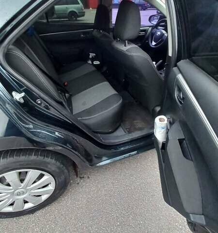 Черный Тойота Королла, объемом двигателя 1.33 л и пробегом 201 тыс. км за 8700 $, фото 3 на Automoto.ua