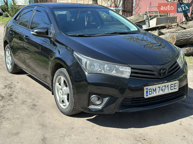 Чорний Тойота Королла, об'ємом двигуна 1.33 л та пробігом 219 тис. км за 9400 $, фото 1 на Automoto.ua