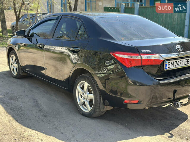 Чорний Тойота Королла, об'ємом двигуна 1.33 л та пробігом 219 тис. км за 9400 $, фото 4 на Automoto.ua