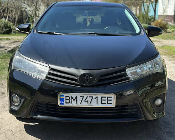 Чорний Тойота Королла, об'ємом двигуна 1.33 л та пробігом 219 тис. км за 9400 $, фото 7 на Automoto.ua