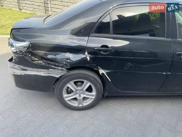 Черный Тойота Королла, объемом двигателя 1.6 л и пробегом 152 тыс. км за 7500 $, фото 4 на Automoto.ua