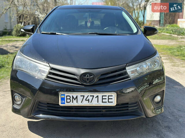 Чорний Тойота Королла, об'ємом двигуна 1.33 л та пробігом 219 тис. км за 9400 $, фото 6 на Automoto.ua