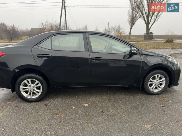 Чорний Тойота Королла, об'ємом двигуна 1.33 л та пробігом 217 тис. км за 7500 $, фото 6 на Automoto.ua