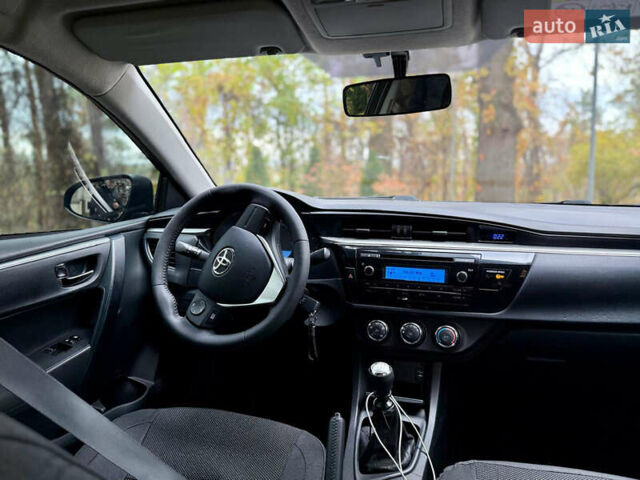 Черный Тойота Королла, объемом двигателя 1.33 л и пробегом 183 тыс. км за 9350 $, фото 5 на Automoto.ua