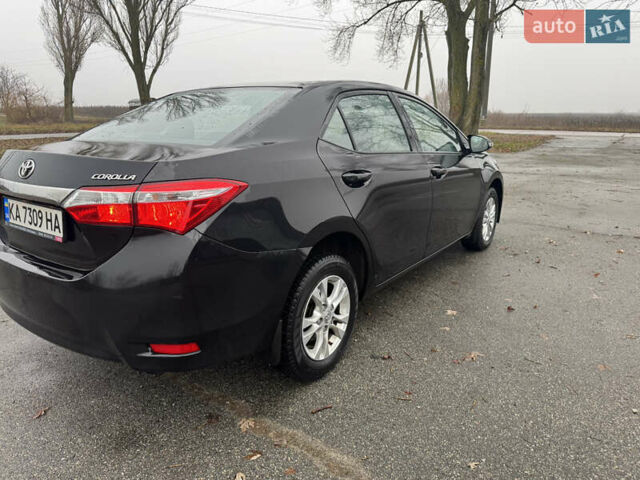 Чорний Тойота Королла, об'ємом двигуна 1.33 л та пробігом 217 тис. км за 7500 $, фото 5 на Automoto.ua