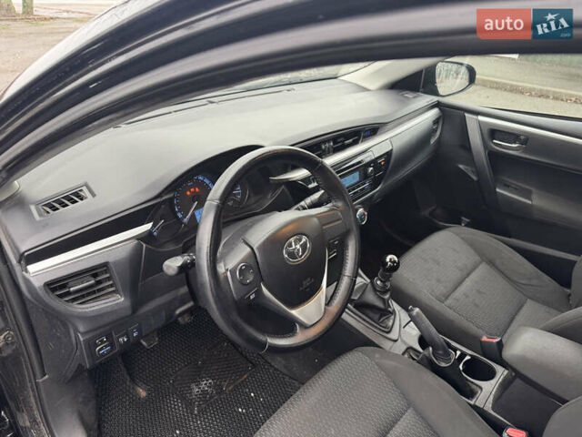 Чорний Тойота Королла, об'ємом двигуна 1.33 л та пробігом 217 тис. км за 7500 $, фото 9 на Automoto.ua