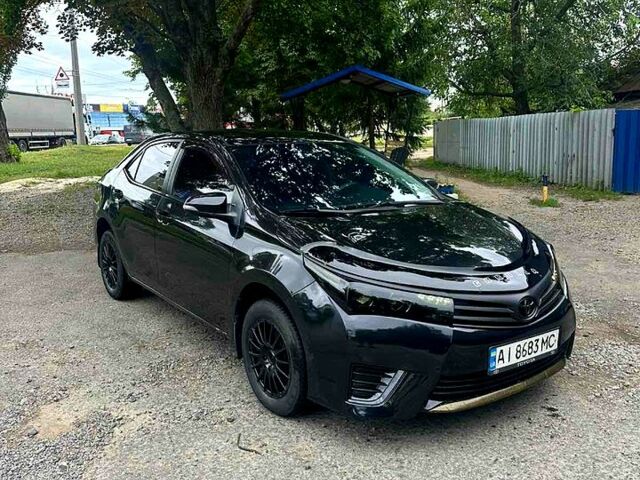 Черный Тойота Королла, объемом двигателя 1.3 л и пробегом 200 тыс. км за 7800 $, фото 1 на Automoto.ua