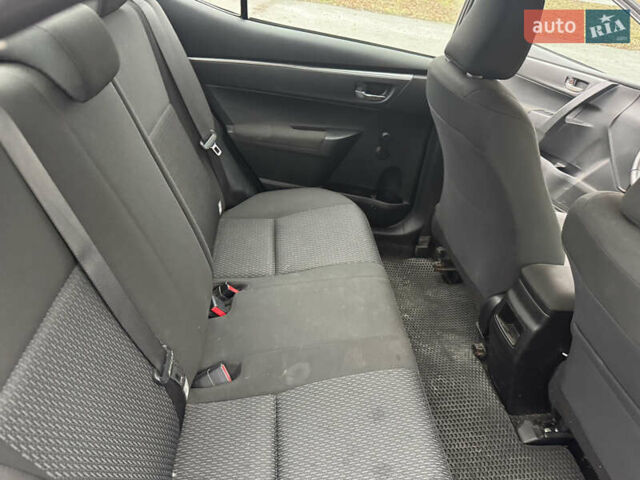 Чорний Тойота Королла, об'ємом двигуна 1.33 л та пробігом 217 тис. км за 7500 $, фото 10 на Automoto.ua