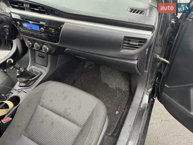 Чорний Тойота Королла, об'ємом двигуна 1.33 л та пробігом 217 тис. км за 7500 $, фото 12 на Automoto.ua