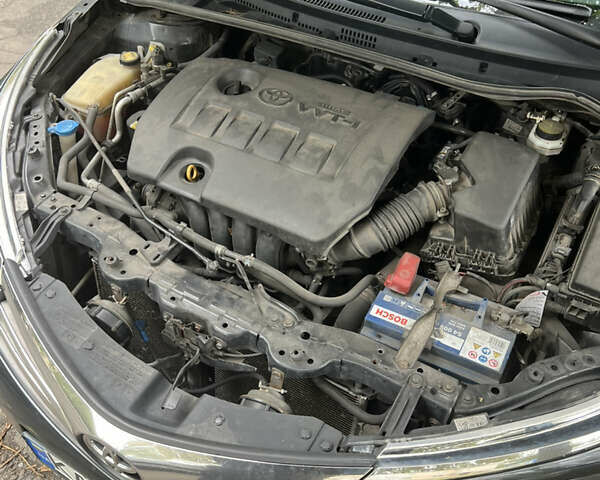 Чорний Тойота Королла, об'ємом двигуна 1.6 л та пробігом 218 тис. км за 11500 $, фото 6 на Automoto.ua